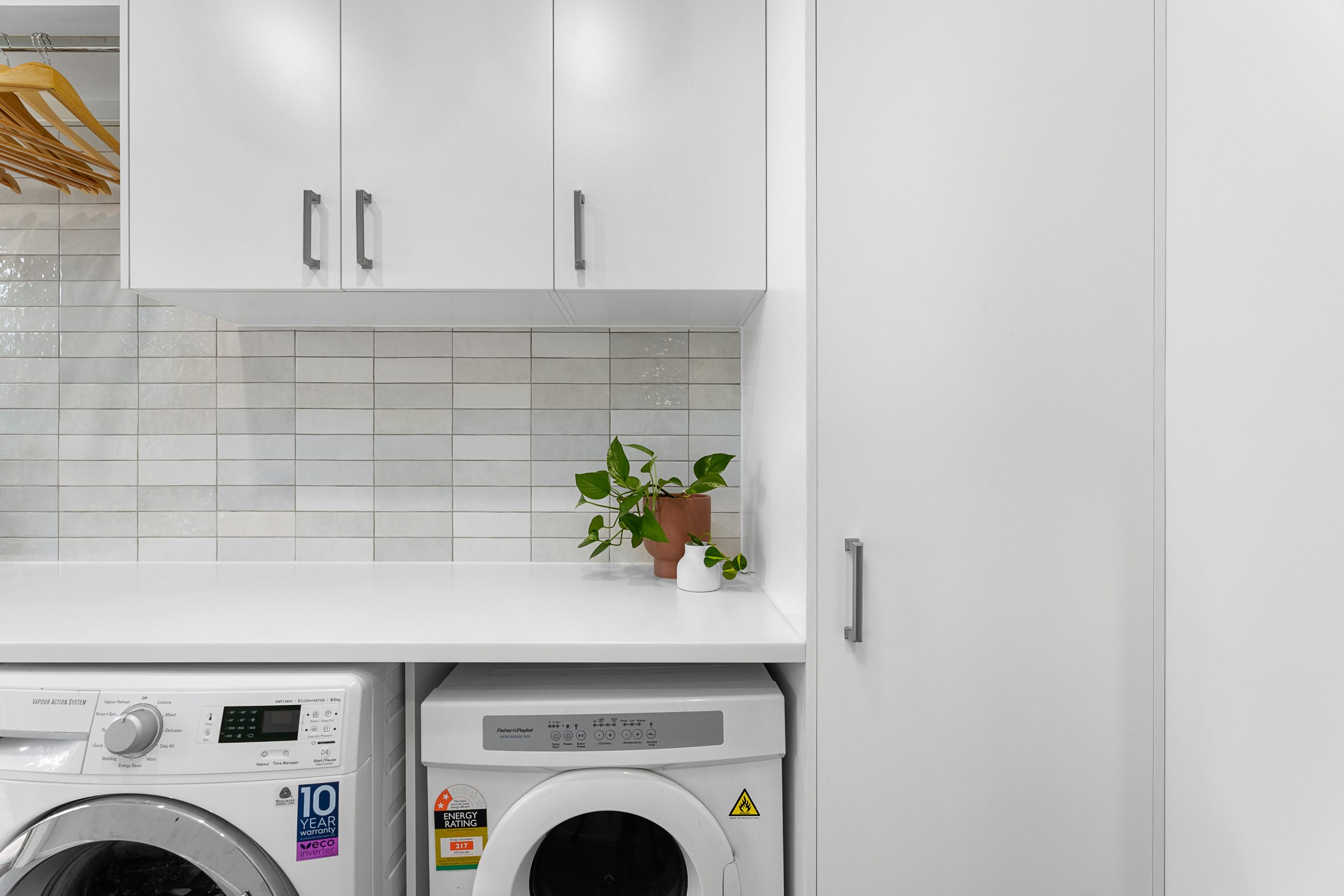 White units in a modern laundry space