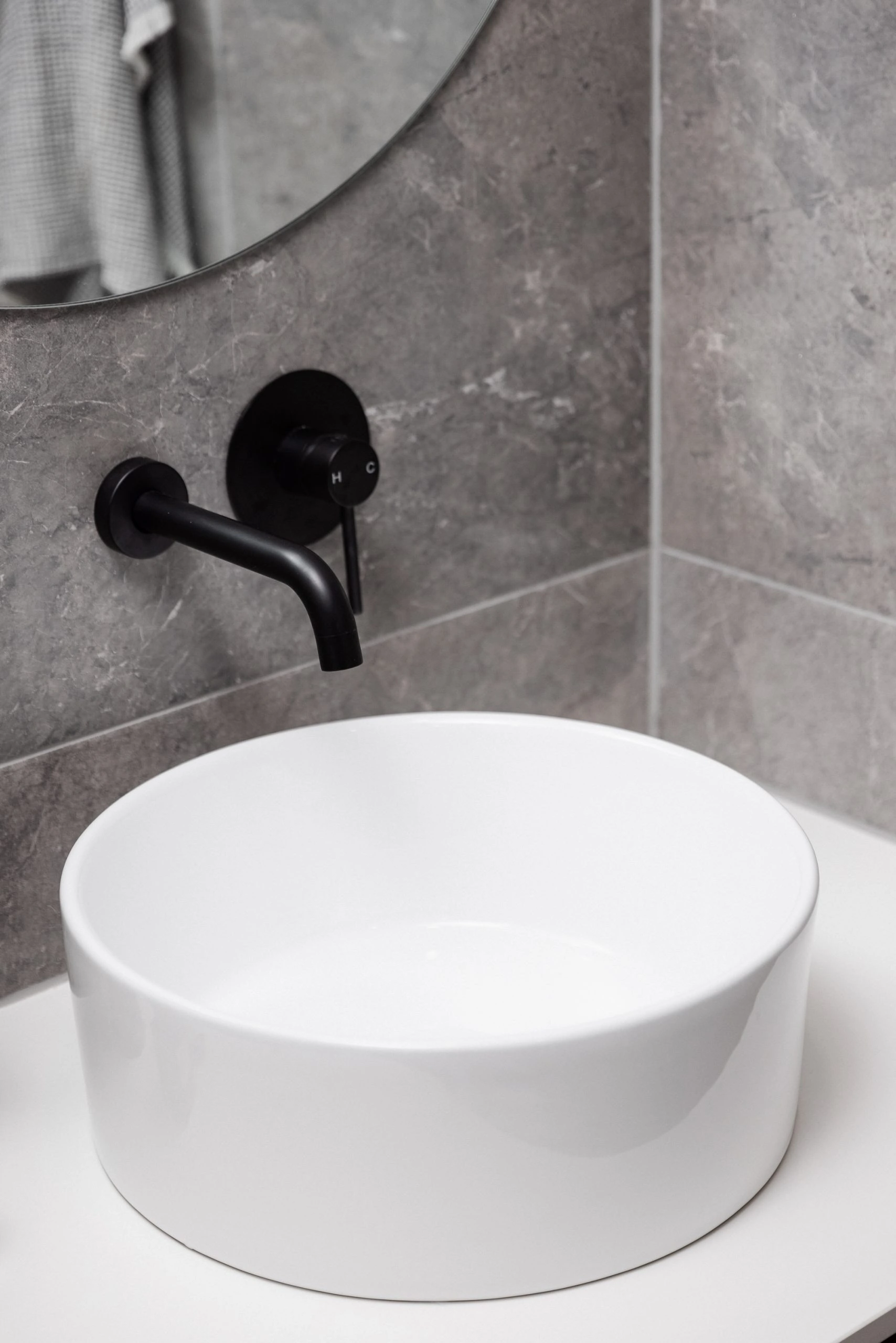 White sink with matte black tap