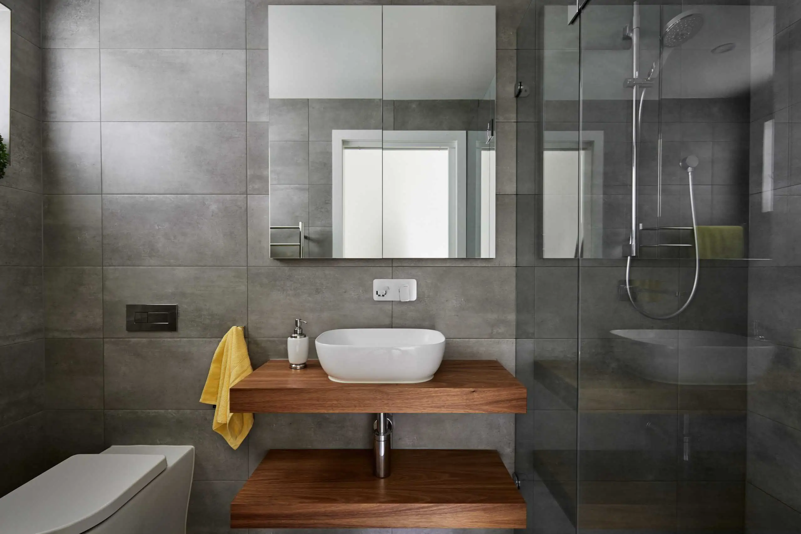 Mirrored wall unit in a modern bathroom